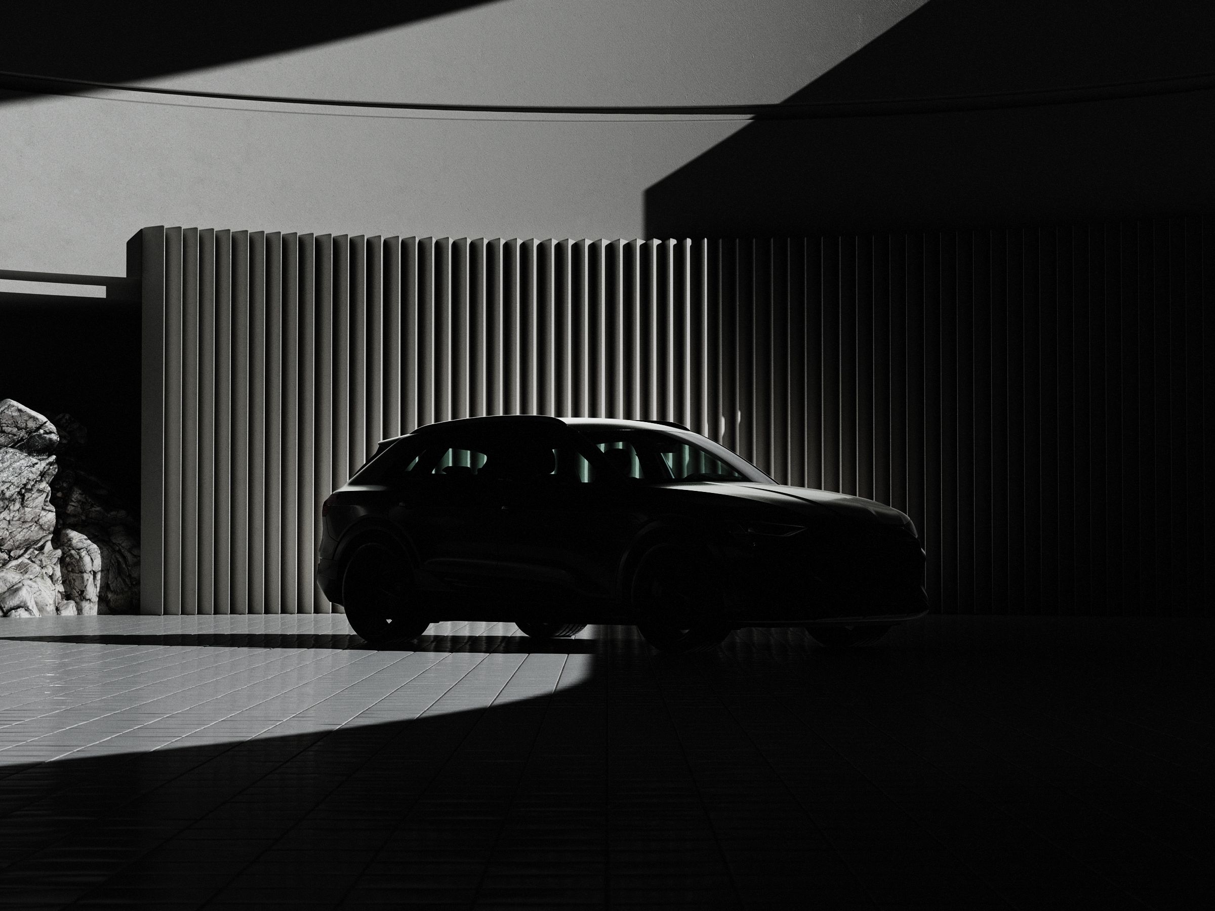 Auto steht vor einer Wand